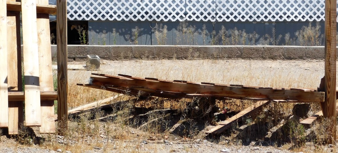 Collapsed fence panel.