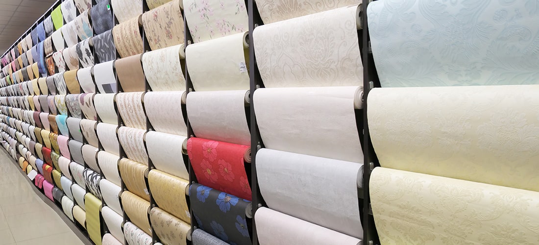 Large collection of wallpapers on display.